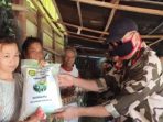 Luar Biasa! Pasukan Hitam dan Loreng Ini Turun Ke Jalan Salurkan Bantuan, Warga: Ini Baru Ormas