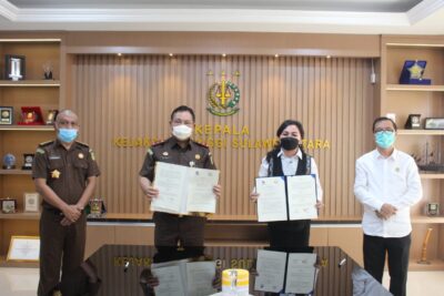 Plt Kajati dan Rektor IAKN Manado Teken PKS Bidang Datun